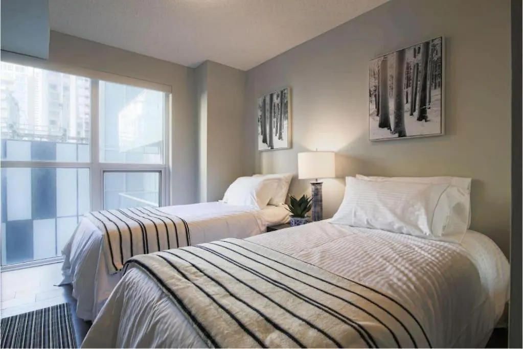Luxury 2 & 3 Bedroom Downtown contacts